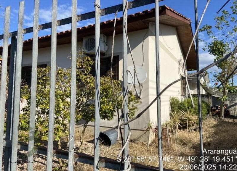 Foto 10 de 12: Casa em leilão em Araranguá - SC, bairro Coloninha — LOTE 012 Imóvel