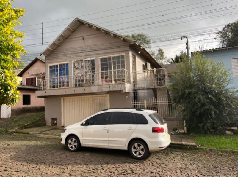 Foto 1 de 4: Casa em leilão em Ijuí - RS, bairro Modelo — LOTE 003 - DIREITOS E AÇÕES - lote urbano nº 20, , bairro Modelo, n/c, c/área de 250m², edificado so