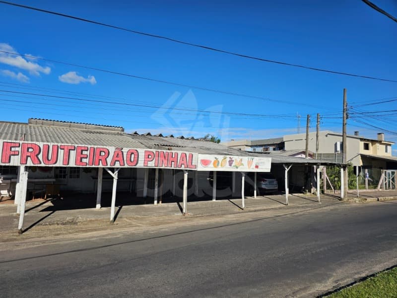 Foto 1 de 2: Comercial em leilão em Balneário Pinhal - RS — LOTE 002 A fração de 50% do imóvel de 720 m² e benfeitorias mistas não averbadas na praia do Pinhal/
