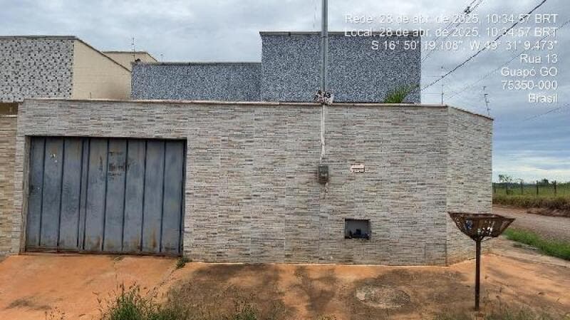 Casa em leilão em Guapó - GO, bairro Setor Central — LOTE 047 LOT RES BANDEIRA-8444427747733