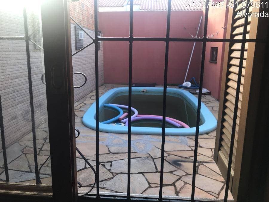 Foto 8 de 11: Casa em leilão em Alvorada - RS — LOTE 25: Casa, Padrão, 1 vaga(s) de garagem ALVORADA RS