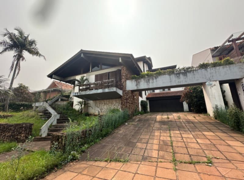 Foto 1 de 6: Terreno em leilão em Ijuí - RS — LOTE 002 TERRENO URBANO COM ÁREA DE 1.075,80M², COM BENFEITORIAS, SITUADO À RUA SÃO PAULO, IJUÍ/RS
