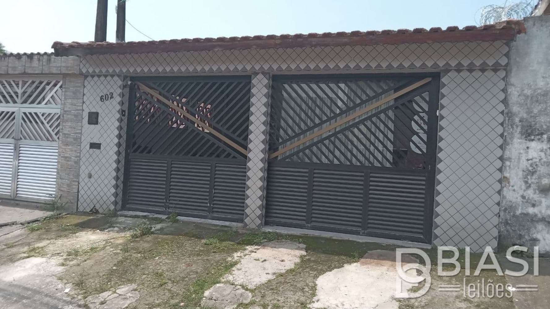 Foto 2 de 5: Casa em leilão em São Vicente - SP, bairro Parque Bitaru — Casa no Parque Bitaru em São Vicente/SP