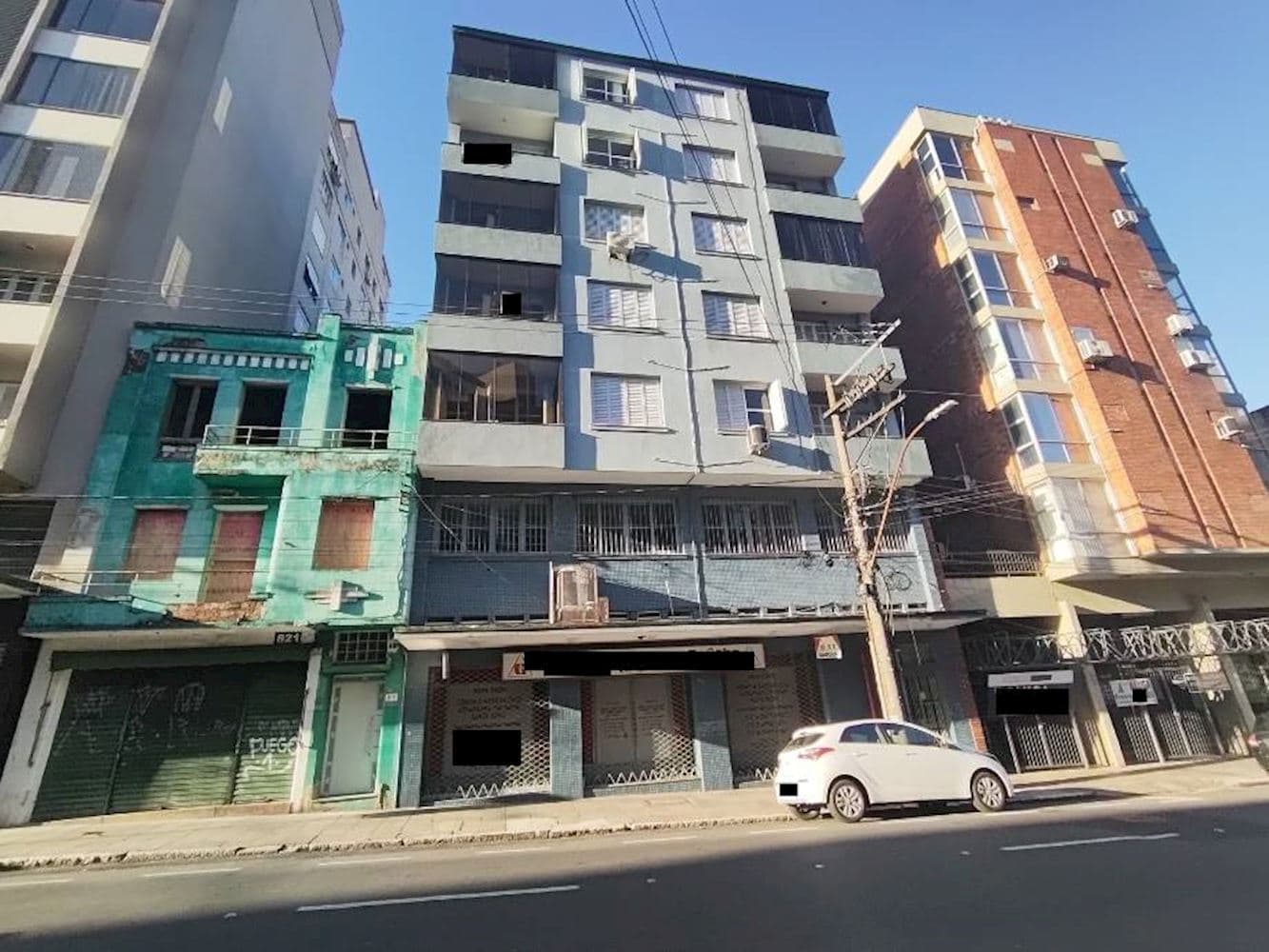 Foto 1 de 10: Comercial em leilão em Porto Alegre - RS, bairro Independencia — Sala Comercial no "Ed. Estoril" - Independência - Porto Alegre/RS
