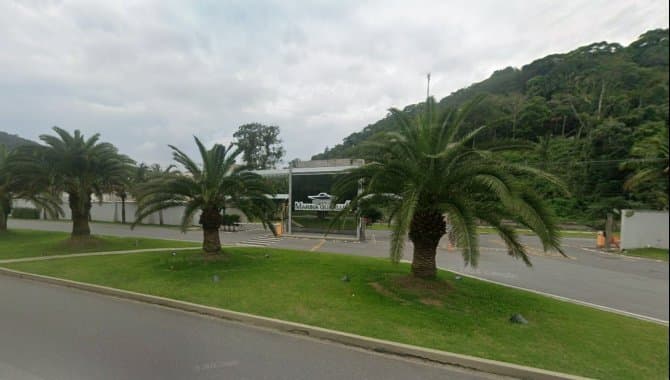Foto 1 de 3: Terreno em leilão em Guarujá - SP — Terreno 1.540 m² (Lote 09 Quadra 03) - Residencial Marina Guarujá - Guarujá - SP