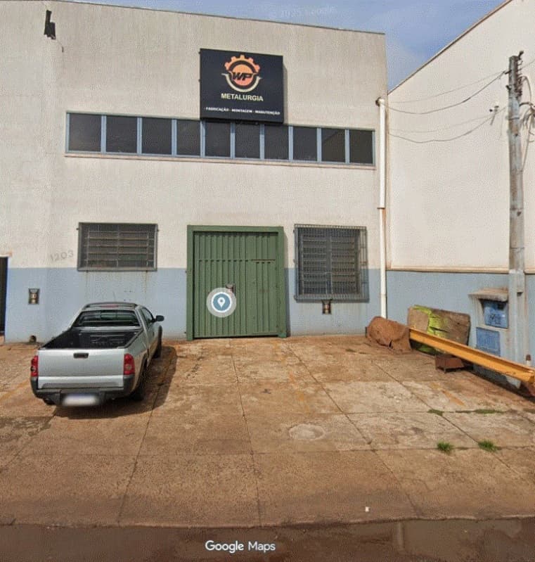 Foto 2 de 5: Terreno em leilão em Cravinhos - SP, bairro Setor Industrial — LOTE 001 BARRACÃO COMERCIAL com 473m² de construção frente para a Rodovia Anhanguera na cidade de Cr