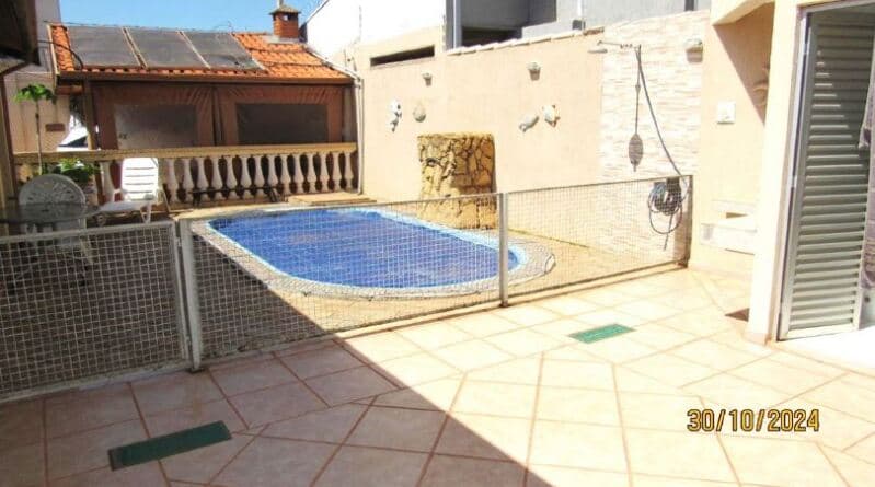Foto 4 de 15: Casa em leilão em Bauru - SP, bairro Vila Pacífico — LOTE 001 Imóvel Residencial com A.C. 182m², A.T. 304m², piscina, Vila Pacífico, Bauru/SP