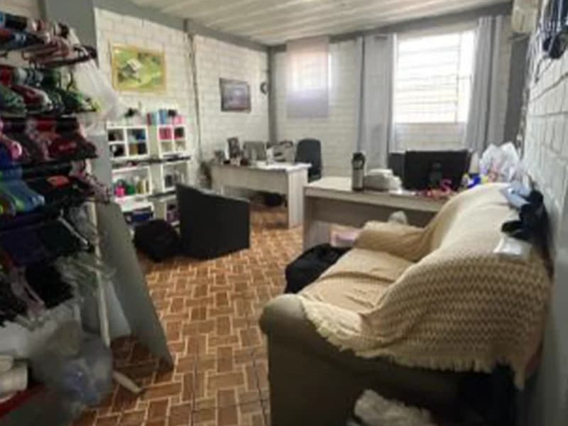 Foto 3 de 8: Casa em leilão em Passo Fundo - RS, bairro Loteamento Professor Schisler — Prédio - Passo Fundo - RS