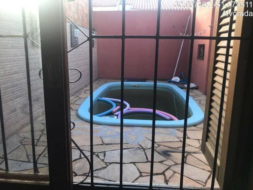Foto 7 de 10: Casa em leilão em Alvorada - RS — Casa à venda em leilão