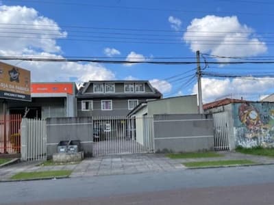 Foto 1 de 2: Apartamento em leilão em Curitiba - PR, bairro Hauer — Imóvel residencial (edifício de apartamentos), com terreno de 516,00m² e 599,31m² de área construída, no bairro Hauer, em Curitiba/PR.