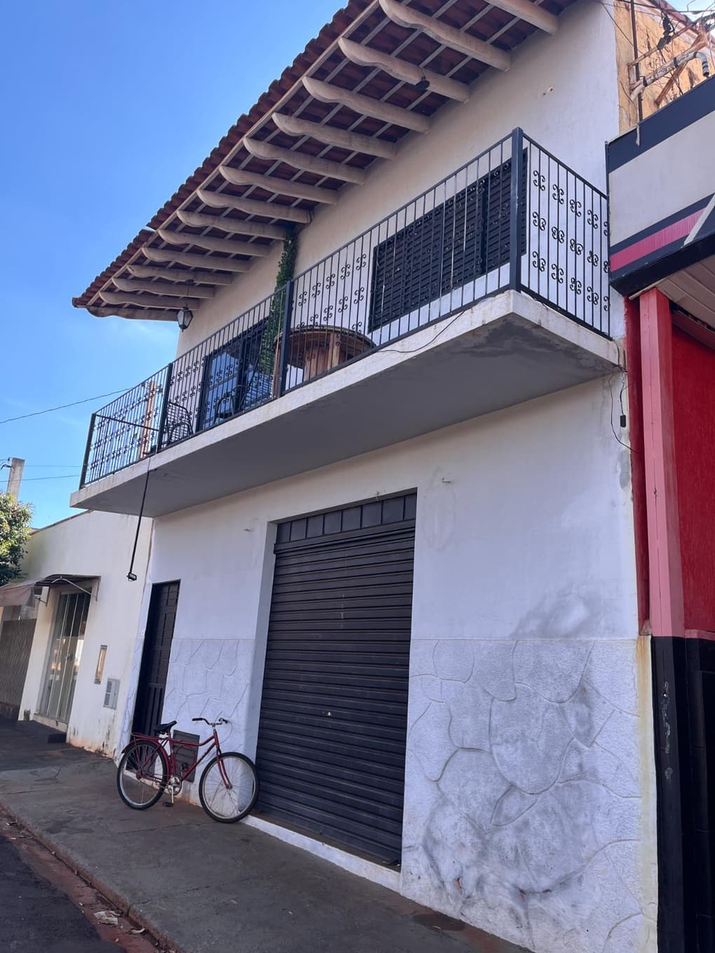 Foto 4 de 8: Comercial em leilão em Populina - SP, bairro Centro — IMÓVEL URBANO COM ESTRUTURA PARA POSTO DE COMBUSTÍVEL + IMÓVEL RESIDENCIAL - POPULINA-SP